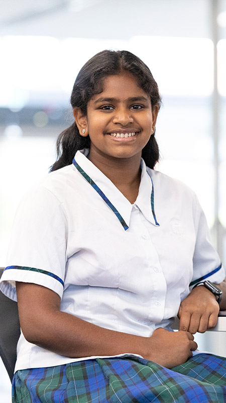 Nagle Catholic College student with latpop.