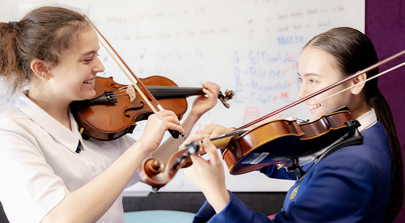 Nagle Catholic College South Blacktown students playing violin
