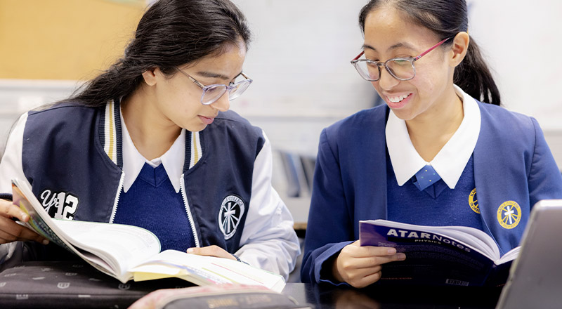 Nagle Catholic College South Blacktown student reading books about the ATAR and HSC process