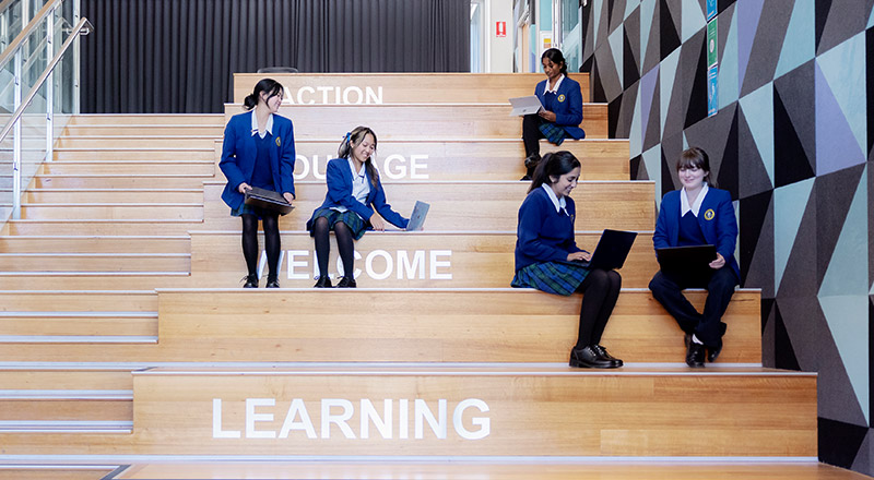 Nagle Catholic College South Blacktown students sitting on staircase