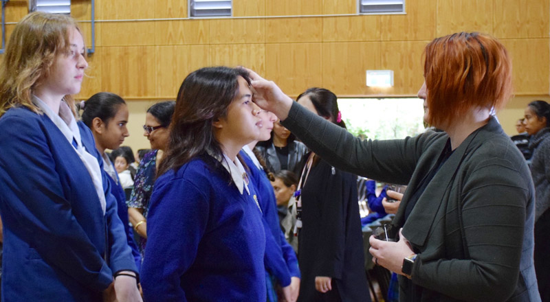 Nagle Catholic College South Blacktown student receiving ashes on Ash Wednesday
