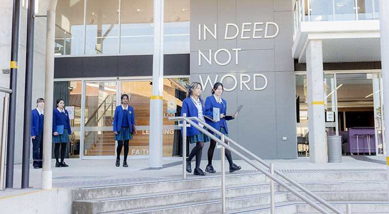 Students walking through Nagle Catholic College South Blacktown campus