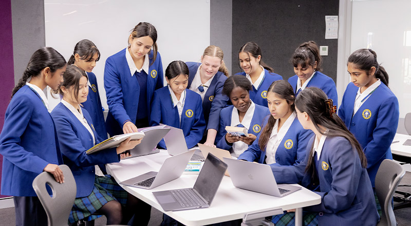 Nagle Catholic College South Blacktown students around a desk
