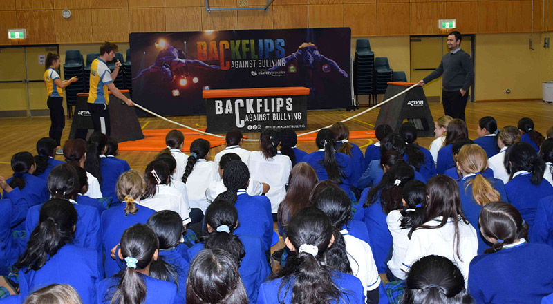Nagle Catholic College South Blacktown students watching a backflips for bullying performance