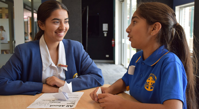 Nagle Catholic College South Blacktown student in year 12 mentoring new year 7 student