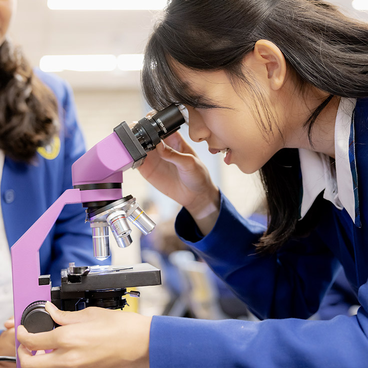 Nagle Catholic College South Blacktown student using microscope
