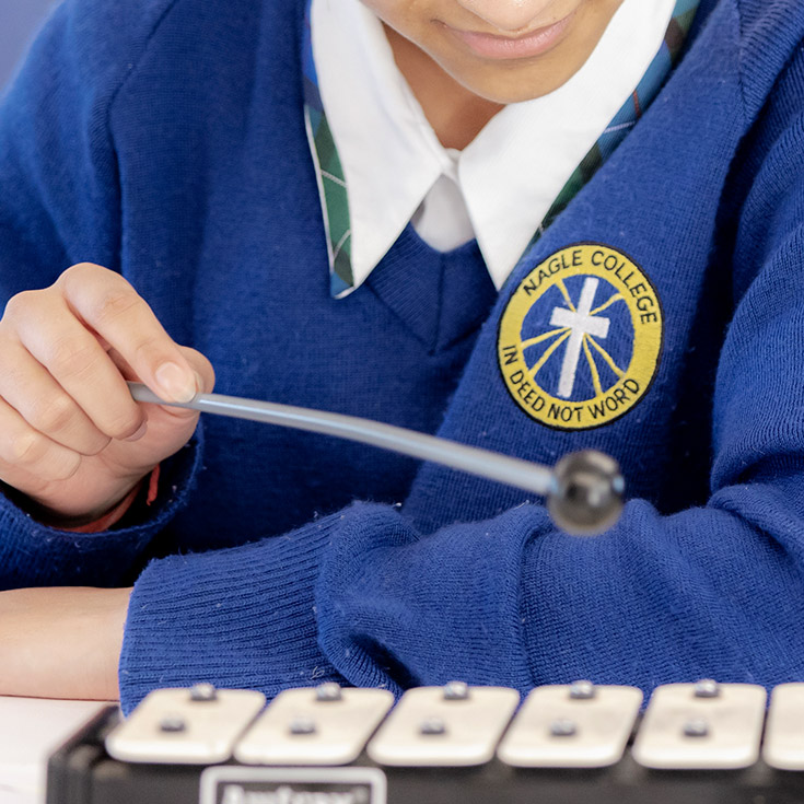 Nagle Catholic College South Blacktown student learning xylophone