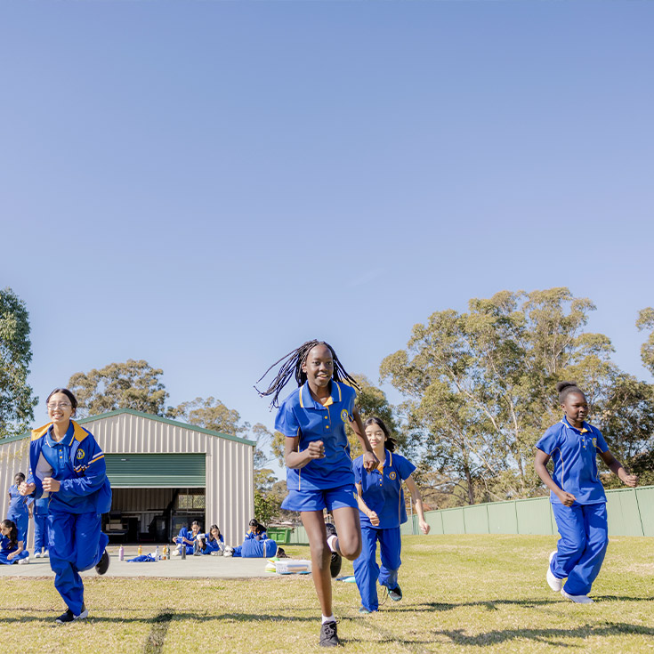 Nagle Catholic College South Blacktown students running on field