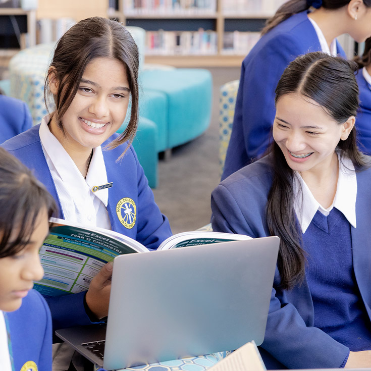 Nagle Catholic College South Blacktown students smiling and reading