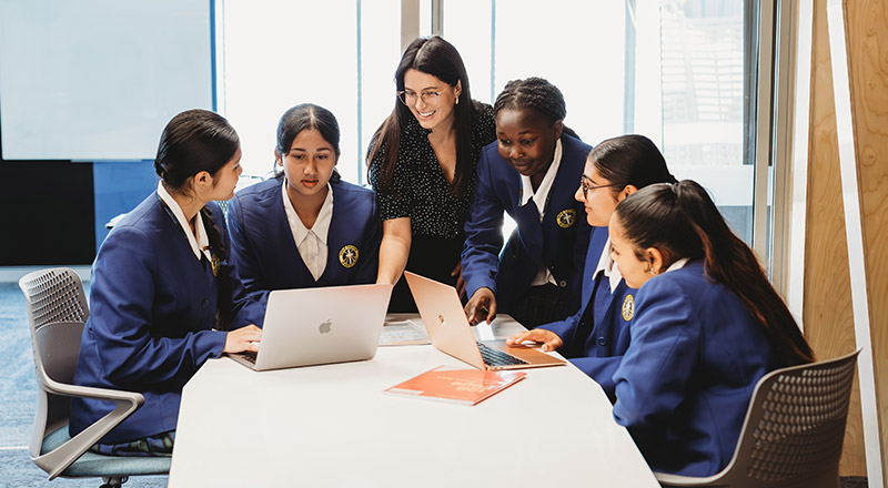 Nagle Catholic College South Blacktown teacher with students in learning space